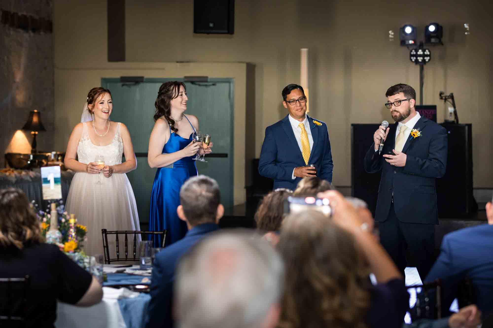 Pat O’Brien wedding photos of bridal party during speech in front of guests