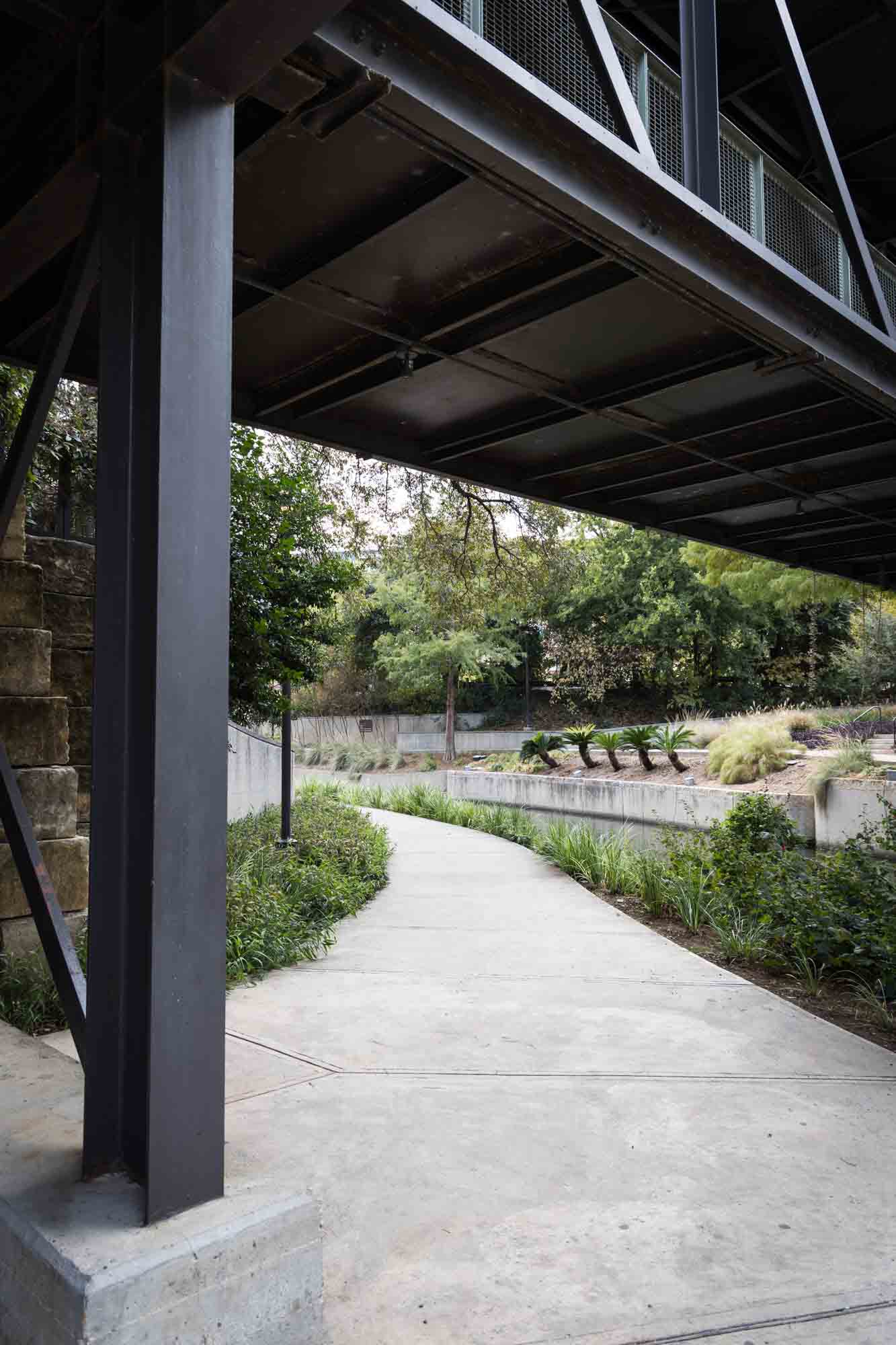 Riverwalk pathway under main bridge for an article on rain backup photo locations at the Pearl in San Antonio