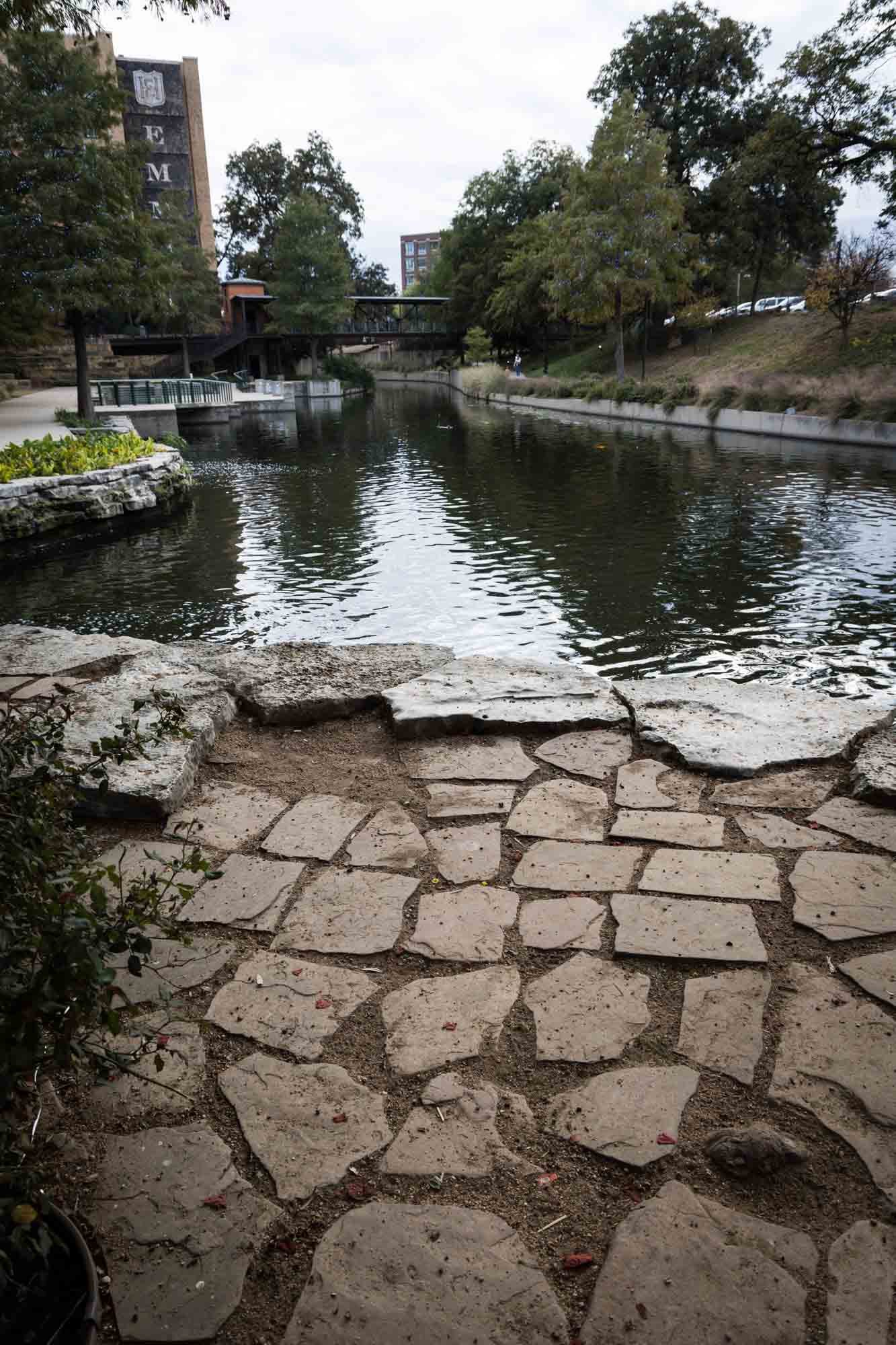 Ground tiles on little island in Pearl Springs for an article on rain backup photo locations at the Pearl in San Antonio