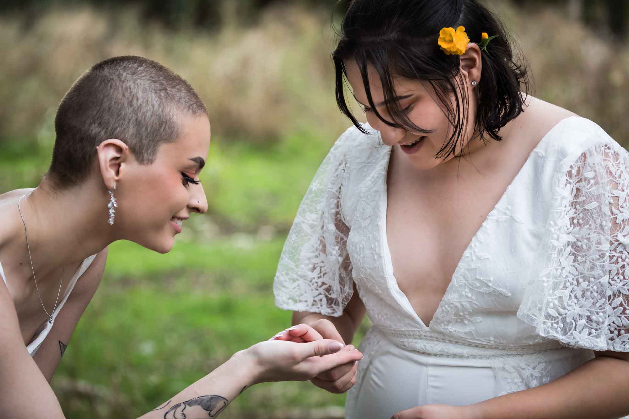 Walker Ranch Park wedding photos of brides looking at ladybug crawling on hand