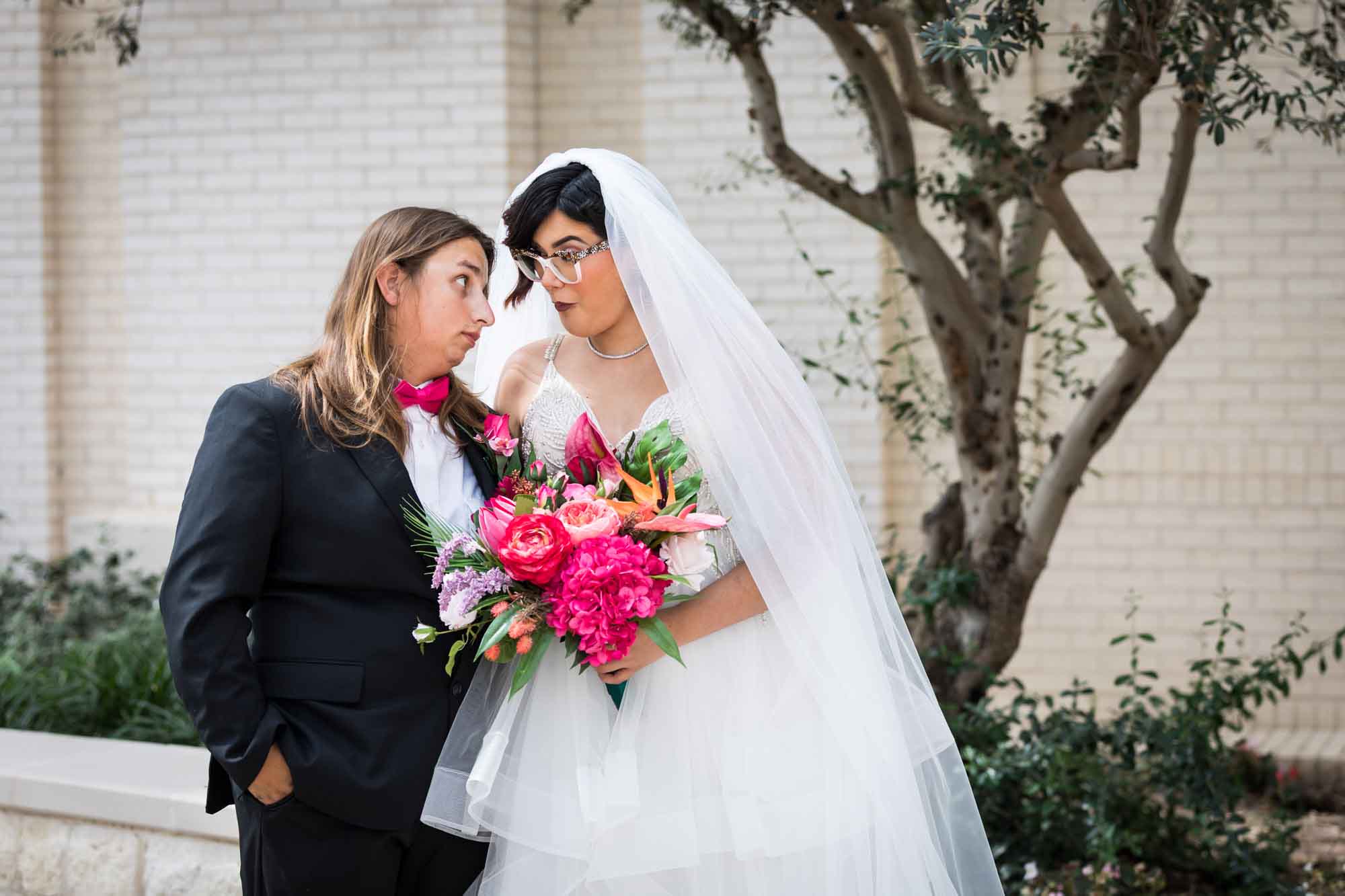 Cornerstone Church wedding photos of bride and groom making funny faces at each other