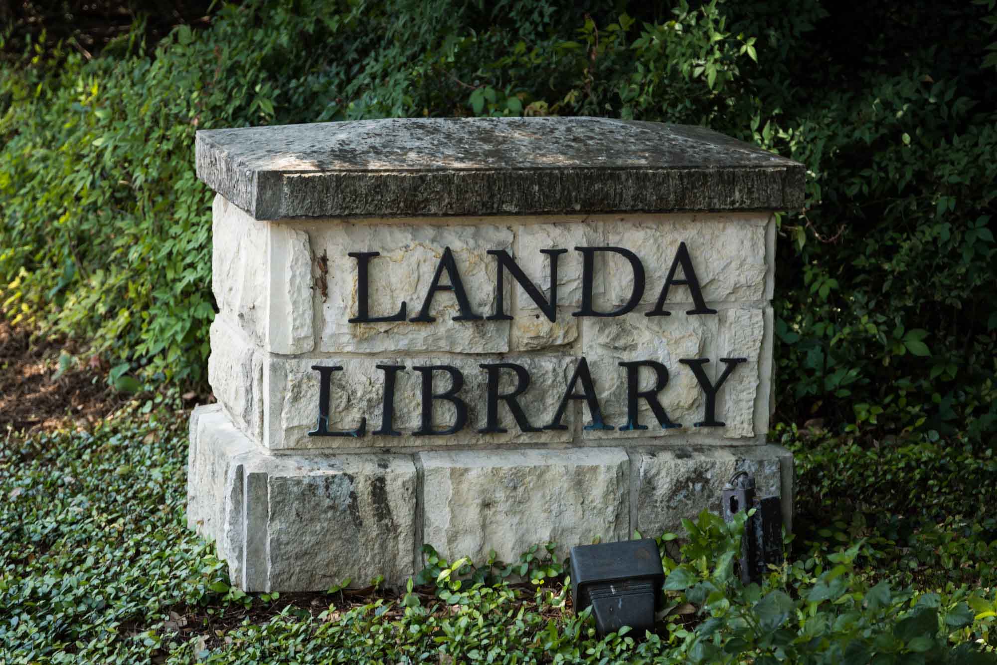Concrete sign for 'Landa Library'