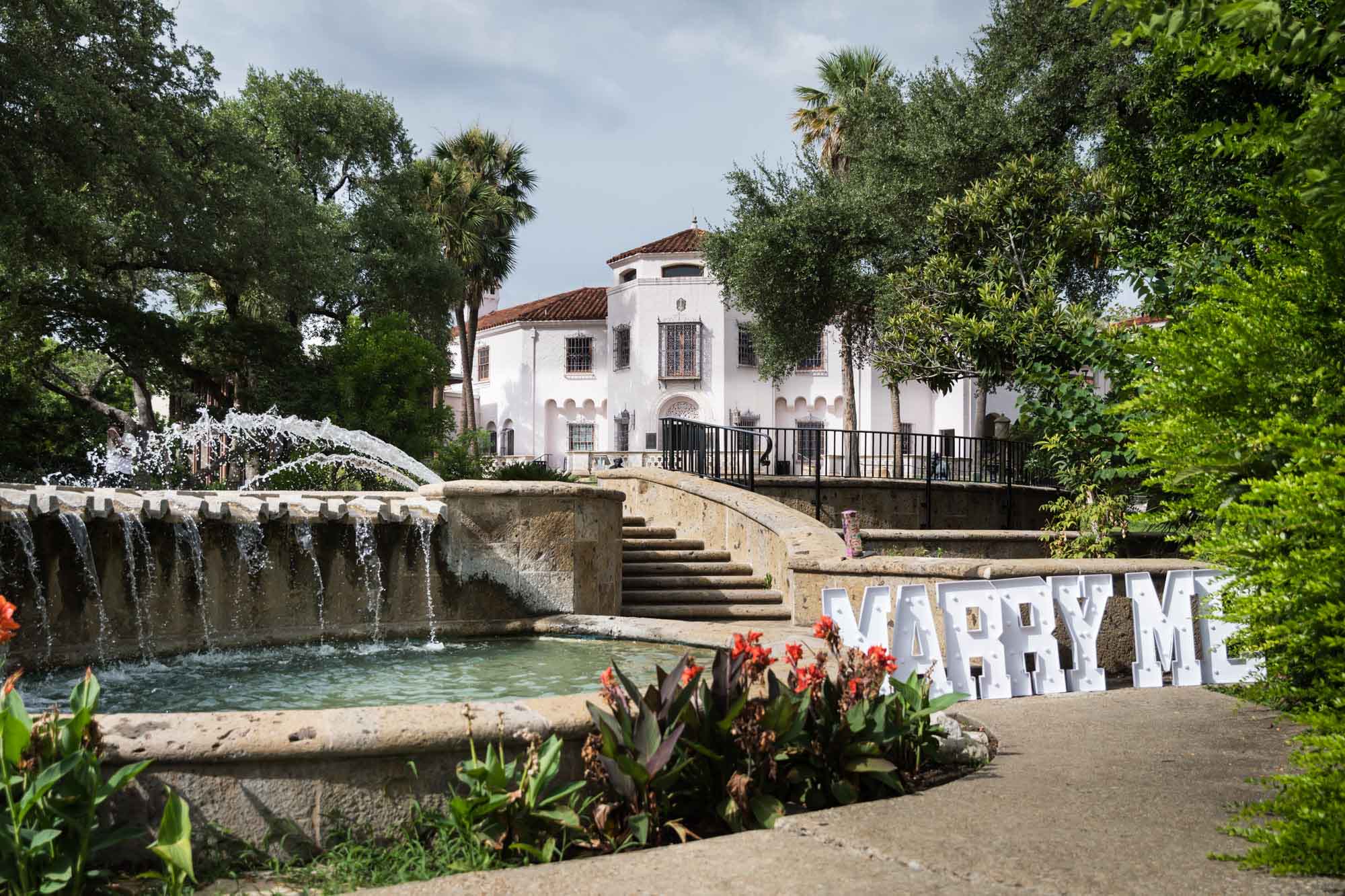 McNay Art Museum and fountain with Marry Me sign in white