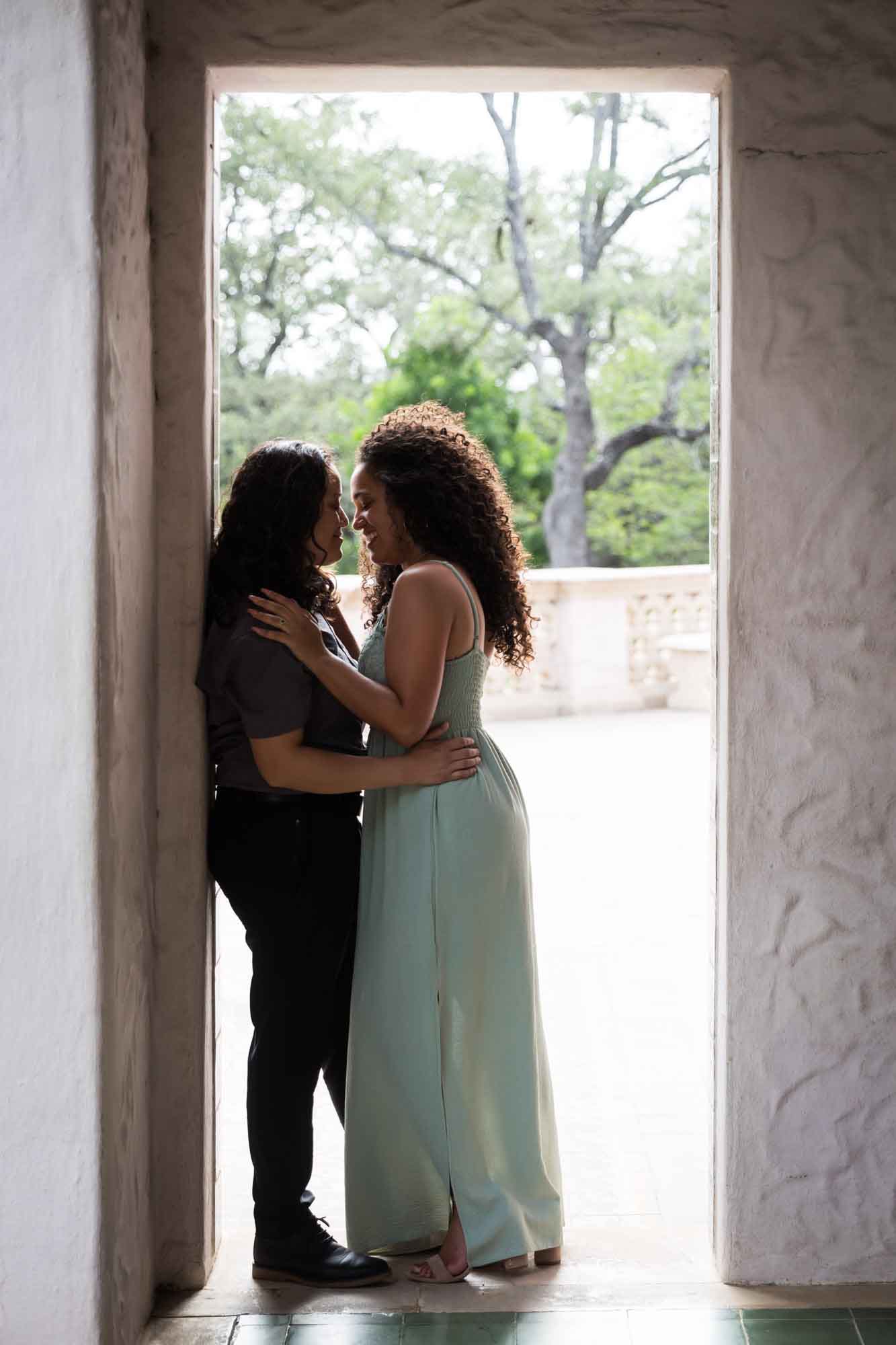 Two women leaning against doorway for an article about McNay Art Museum proposal tips
