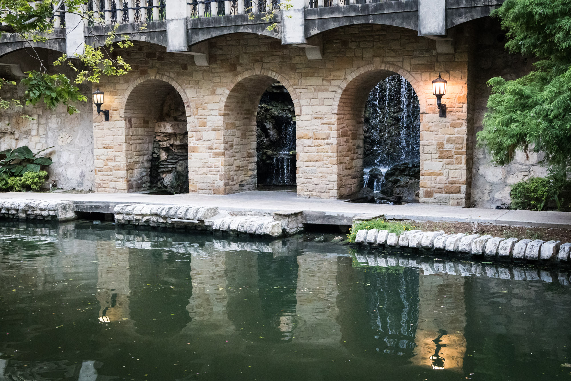Waterfalls along River Walk at Travis Street