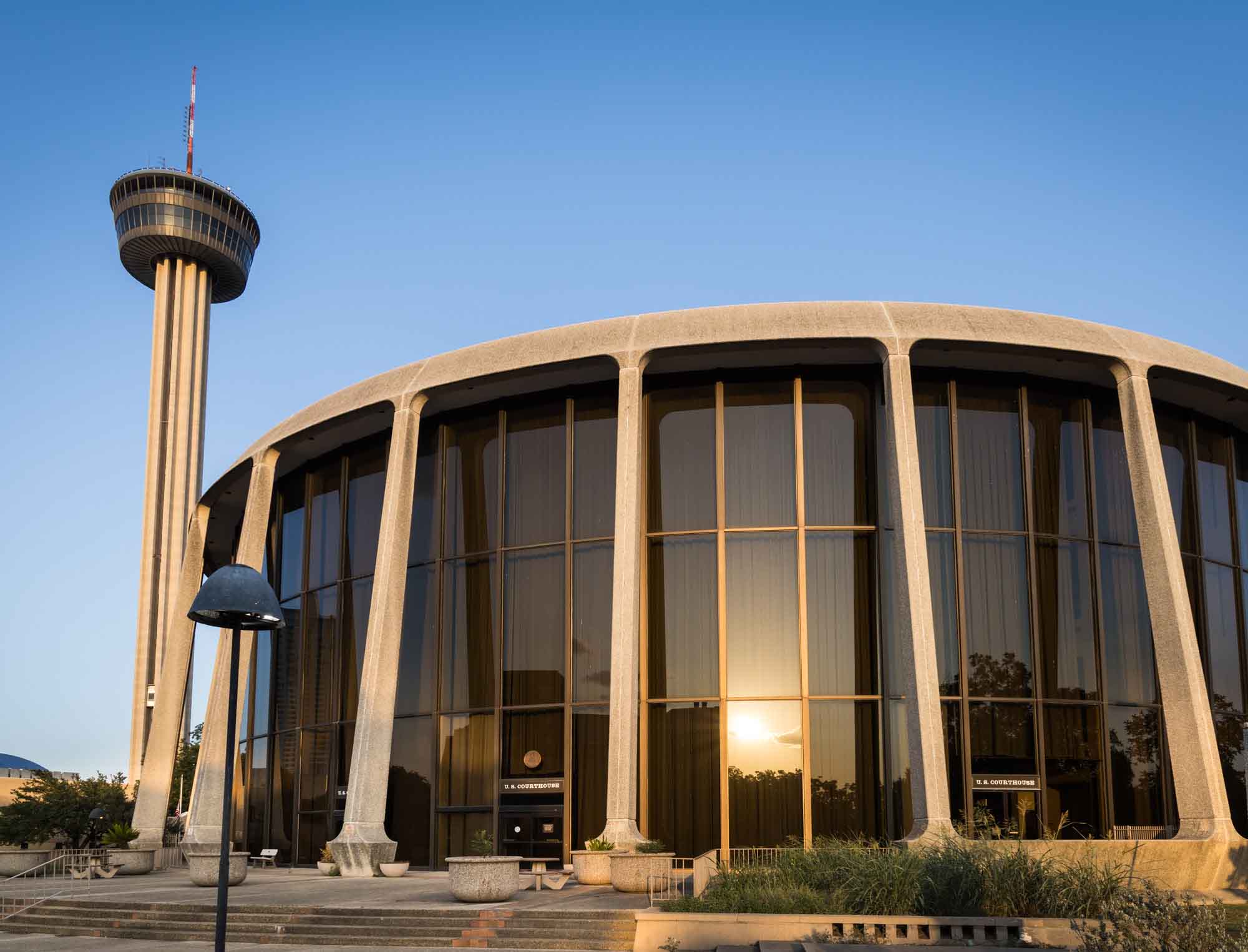 John H. Wood Jr. Federal Courthouse with Tower of the Americas in the background
