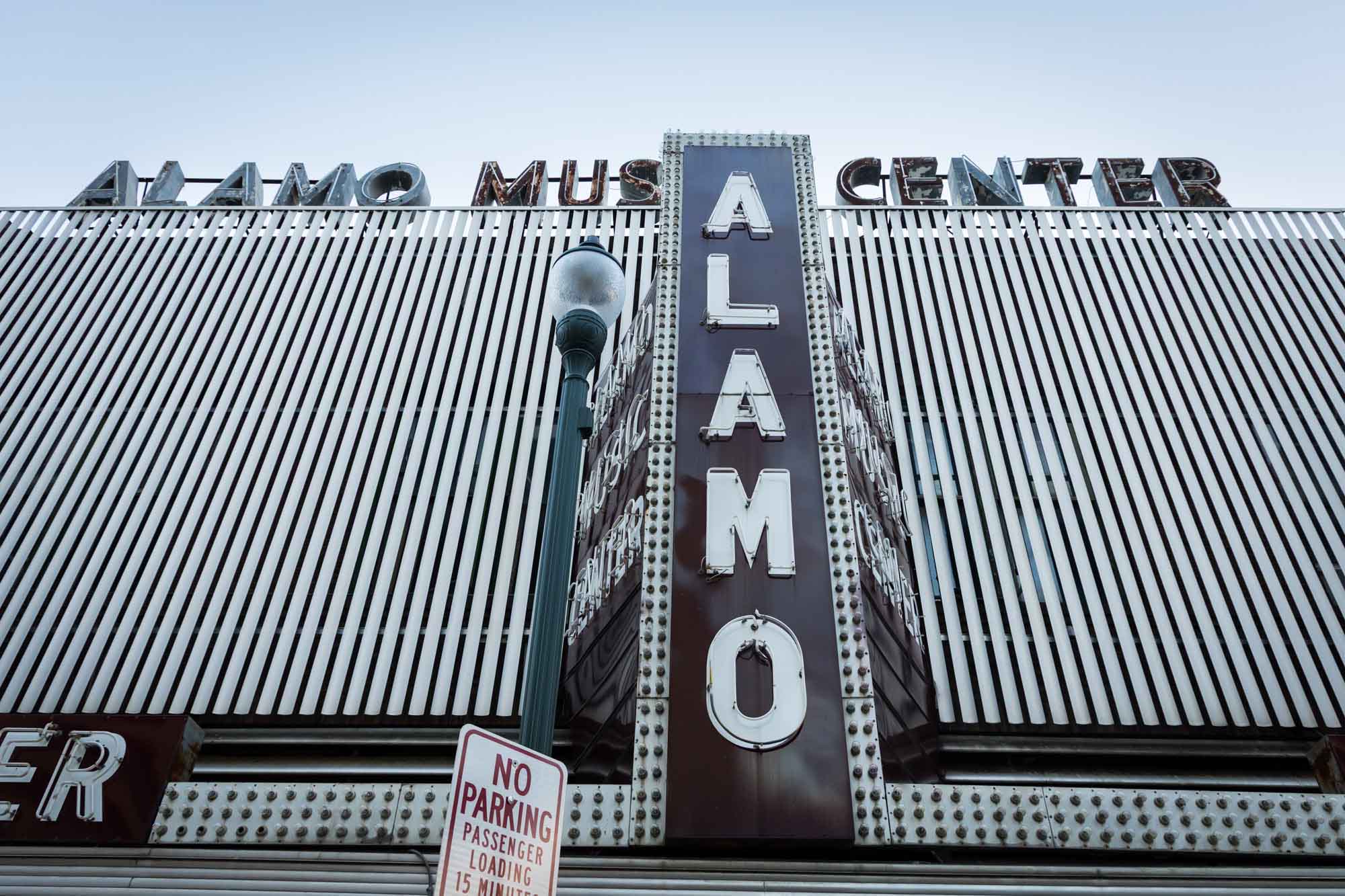 Retro neon storefront of Alamo Music Center in downtown San Antonio