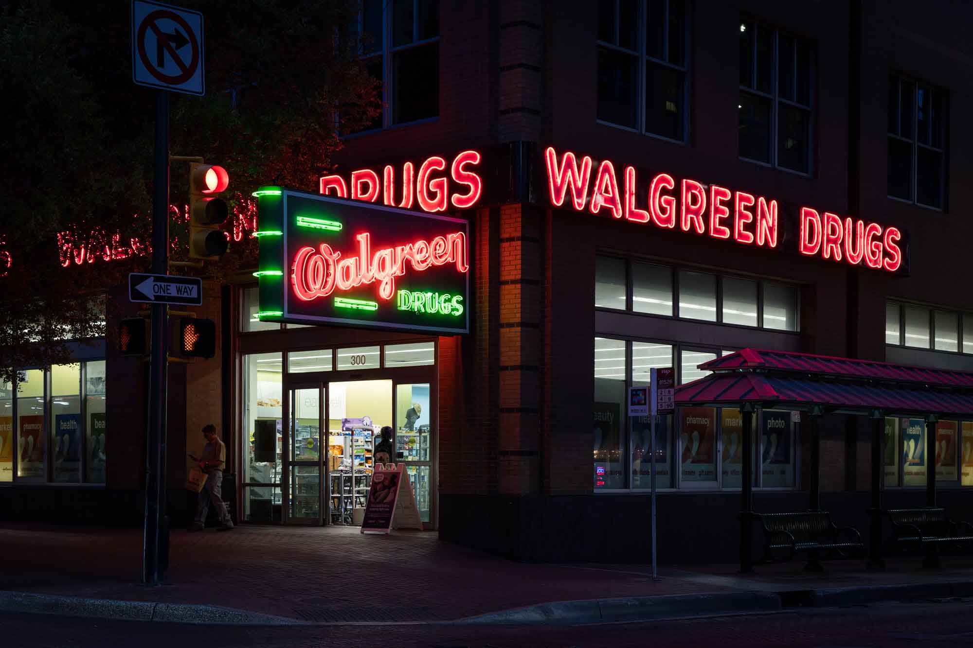 Vintage neon sign of Walgreens in downtown San Antonio at night
