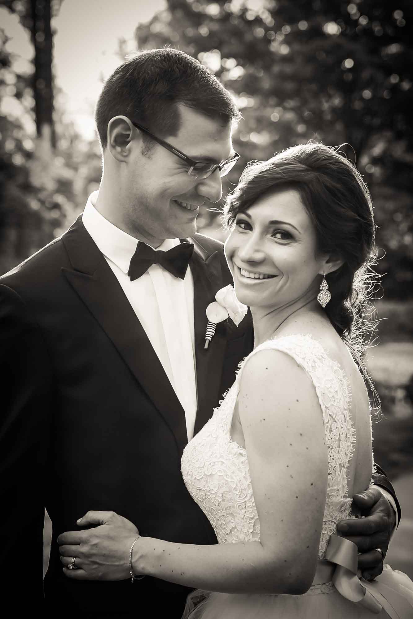 Black and white bride and groom portrait after their Fordham University Church wedding for an article on what to have ready when the wedding photographer arrives