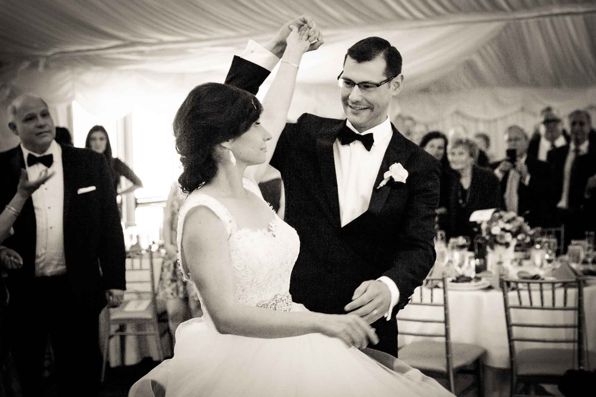 First dance at a Pelham Bay & Split Rock Golf Club wedding reception for an article on what to have ready when the wedding photographer arrives