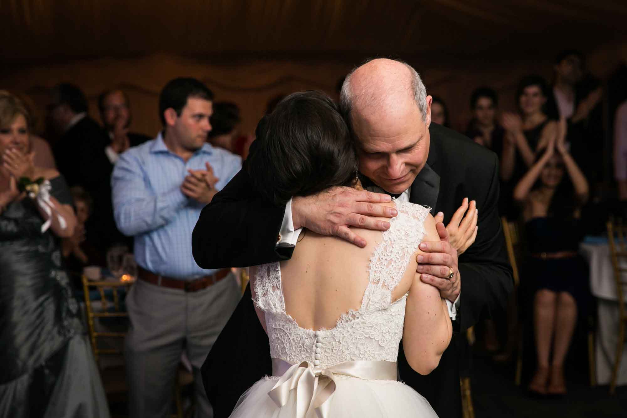 Father daughter dance at a Pelham Bay & Split Rock Golf Club wedding reception for an article on what to have ready when the wedding photographer arrives