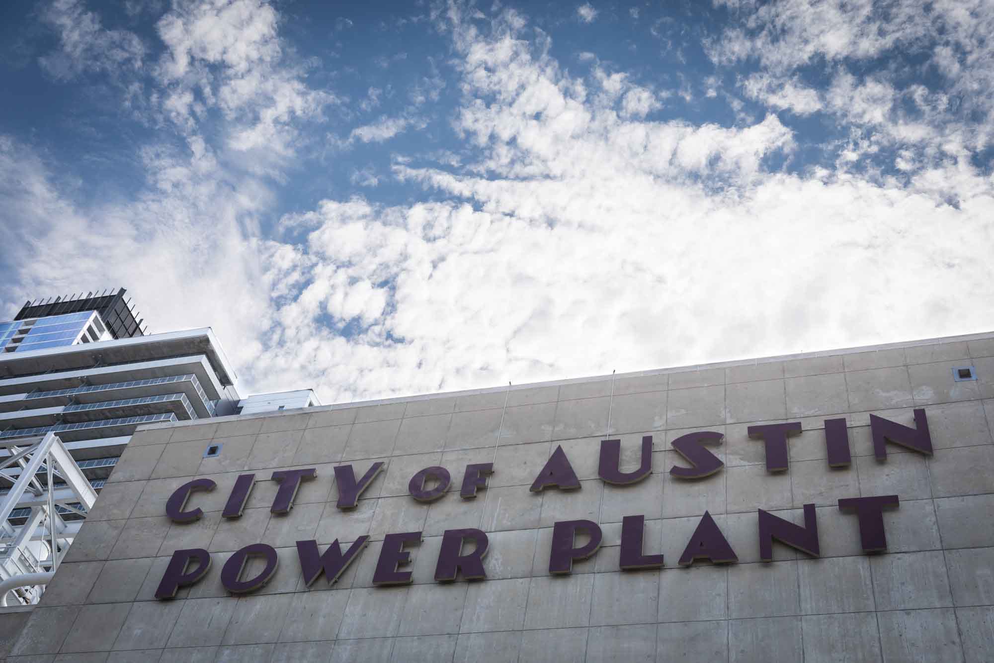 City of Austin Power Plant sign with sky and clouds above for an article on the best places to propose in Austin