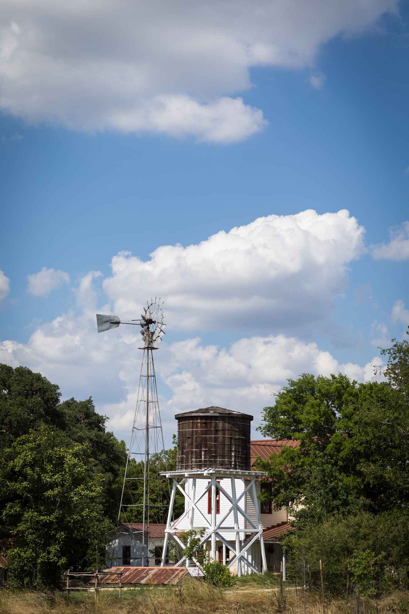 Water tower and windmill at Herff Farm for an article on Cibolo Nature Center surprise proposal tips