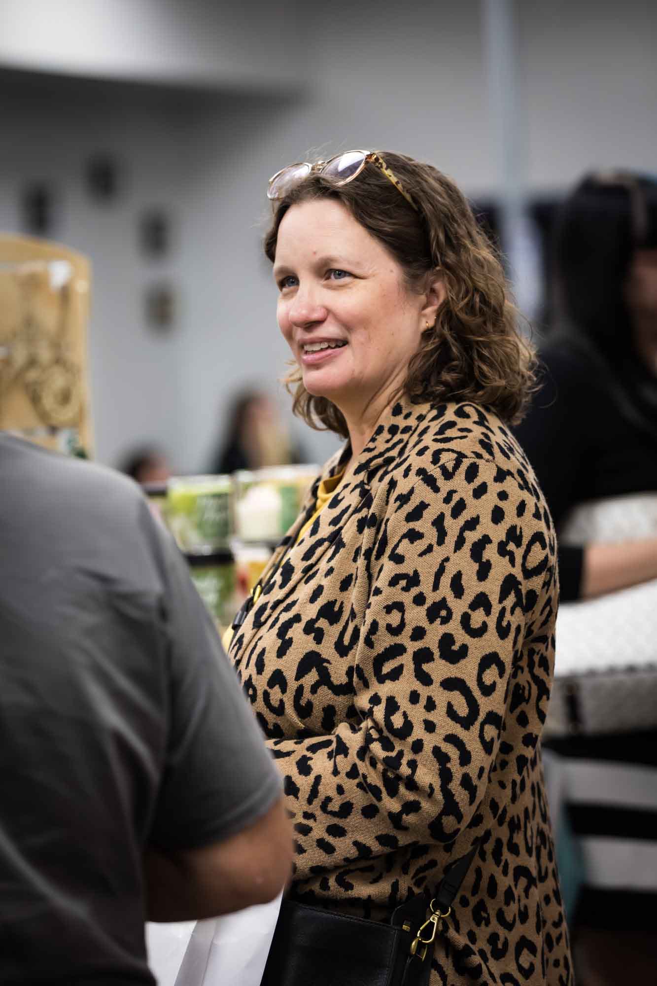 Austin book launch party photos of woman wearing leopard-print shirt at Birdhouse Books
