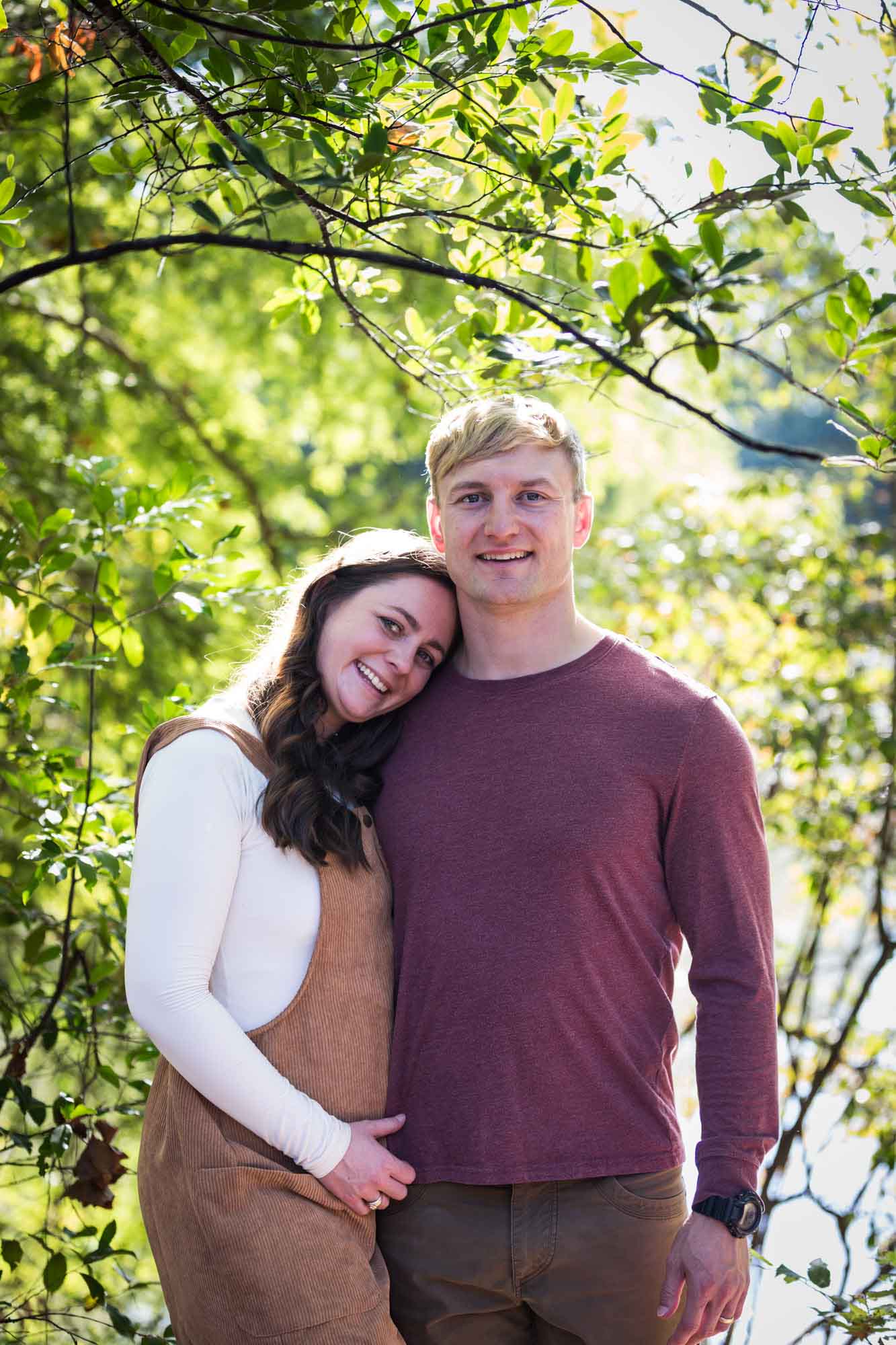 San Antonio Botanical Gardens family portrait of woman with head resting on man's shoulder in the forest