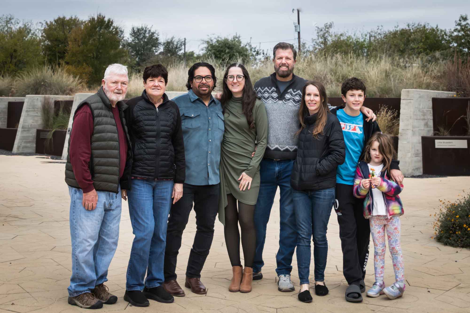 Family of eight people standing together during a Confluence Park family portrait session