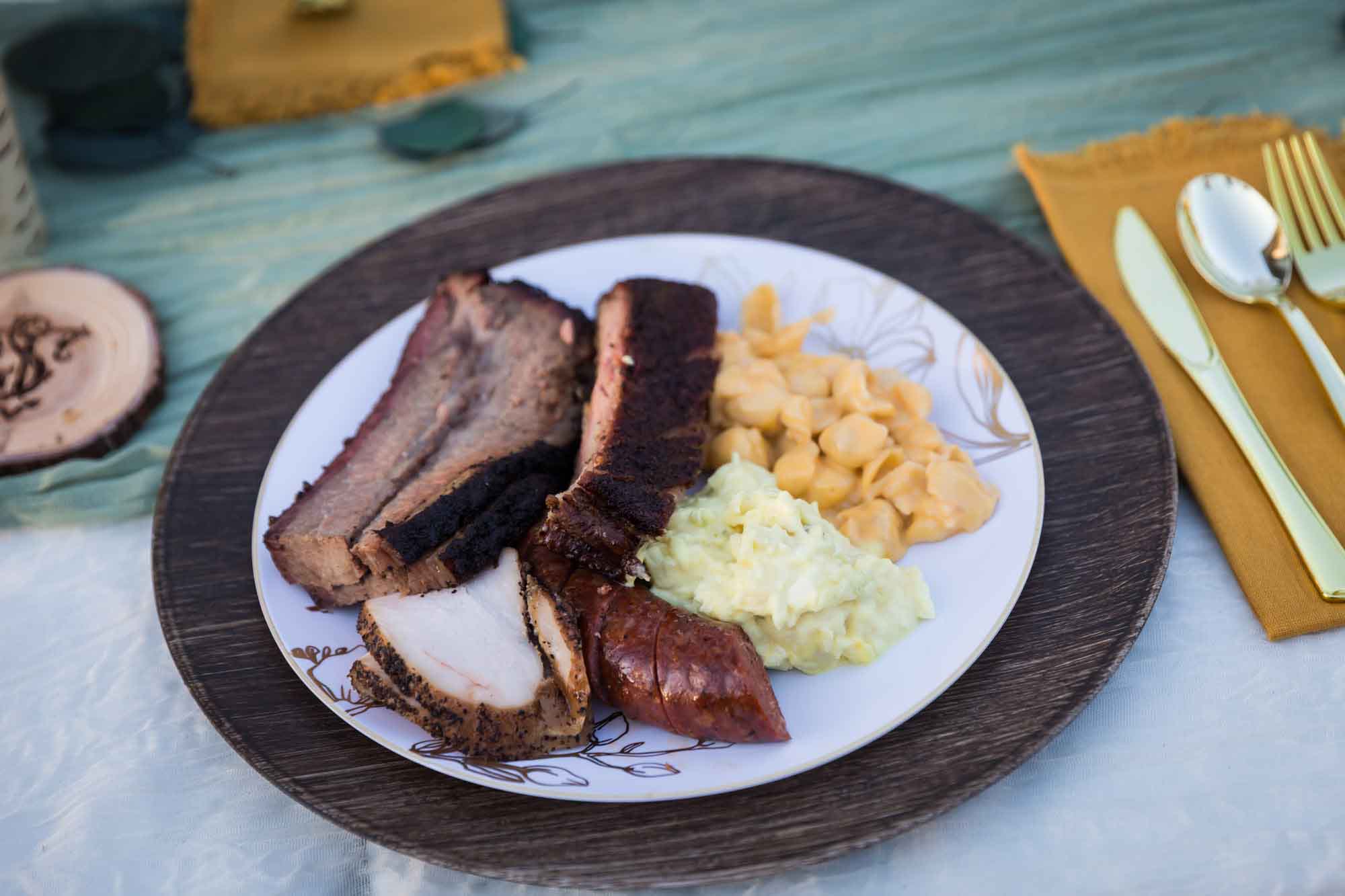 Plate of barbecue from 2M Smokehouse served at a San Antonio DIY wedding