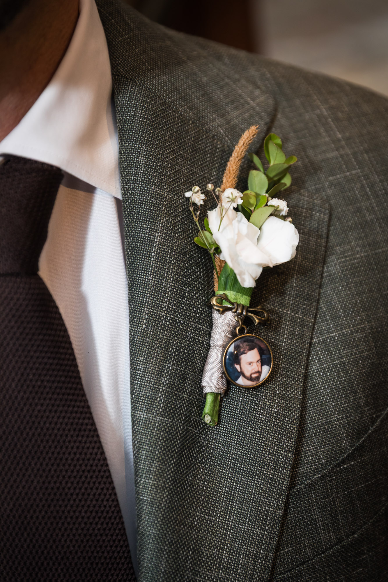 Close up of groom's boutonniere at a Chapel Dulcinea wedding