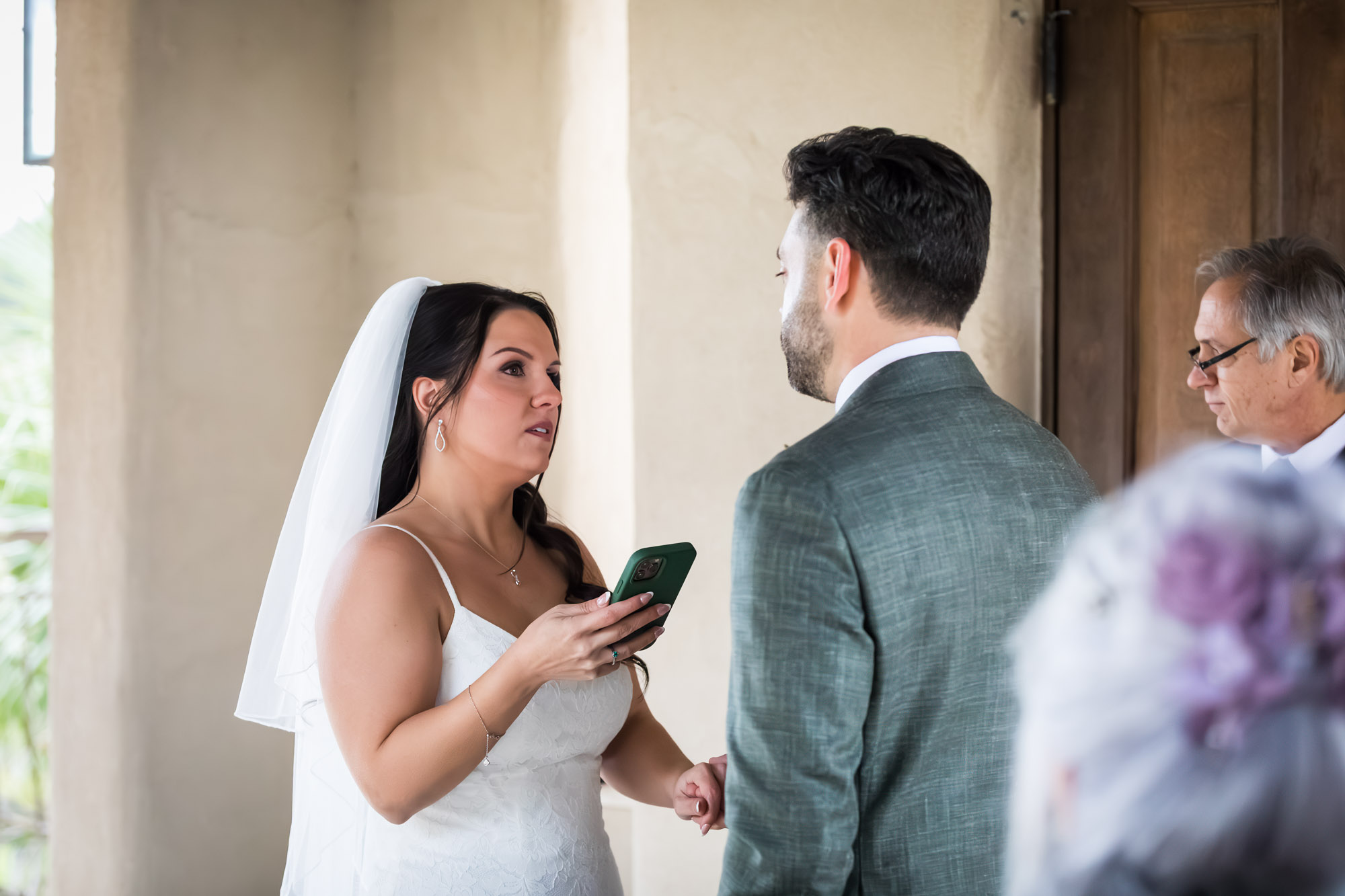 Bride and groom saying vows during ceremony at a Chapel Dulcinea wedding