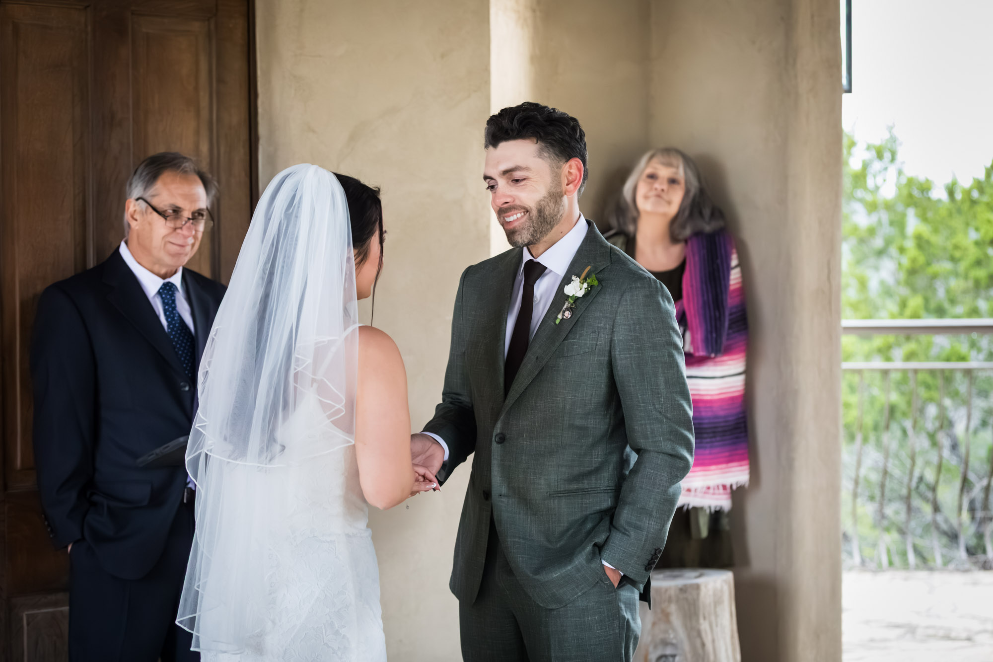 Bride and groom saying vows during ceremony at a Chapel Dulcinea wedding