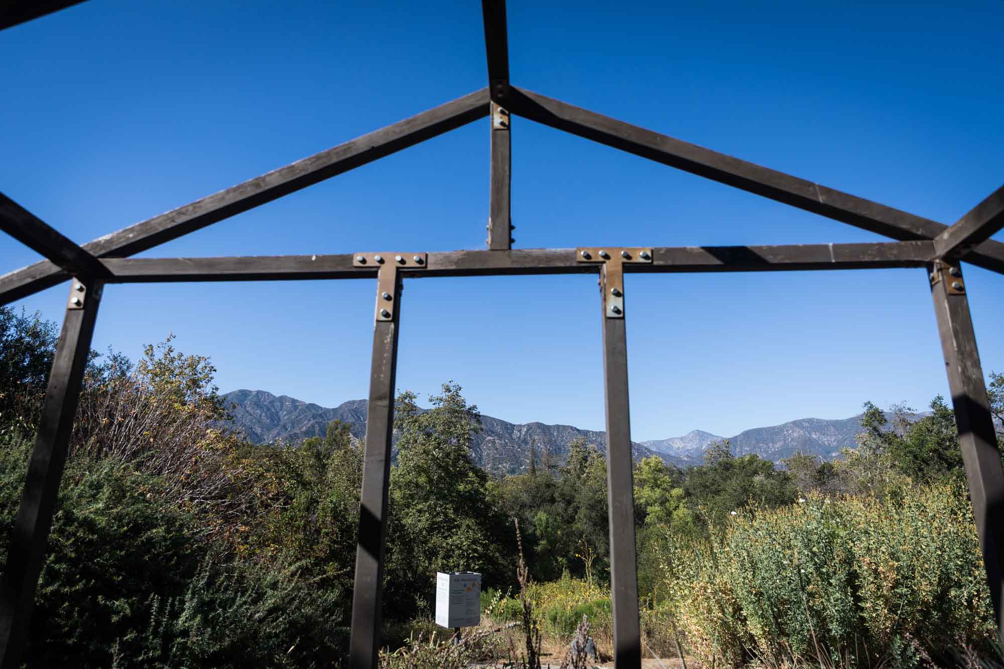 View of mountains from wooden gazebo of Mountain View for an article on the best photo shoot locations in Descanso Gardens