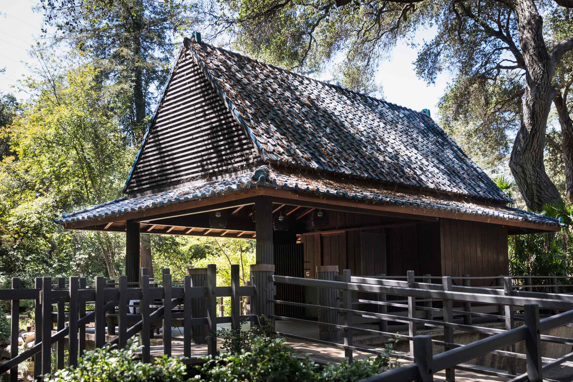 Wooden house with steep roof in Japanese Garden for an article on the best photo shoot locations in Descanso Gardens