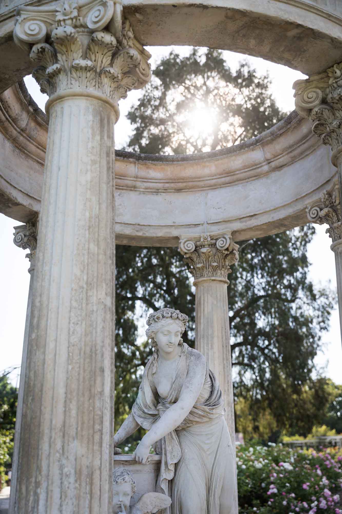Close up on stone sculpture in Rose Garden for a Huntington Gardens photo shoot guide article