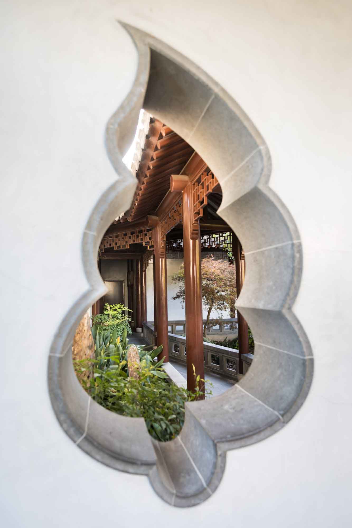 Leaf-shaped window in Chinese Garden for a Huntington Gardens photo shoot guide article