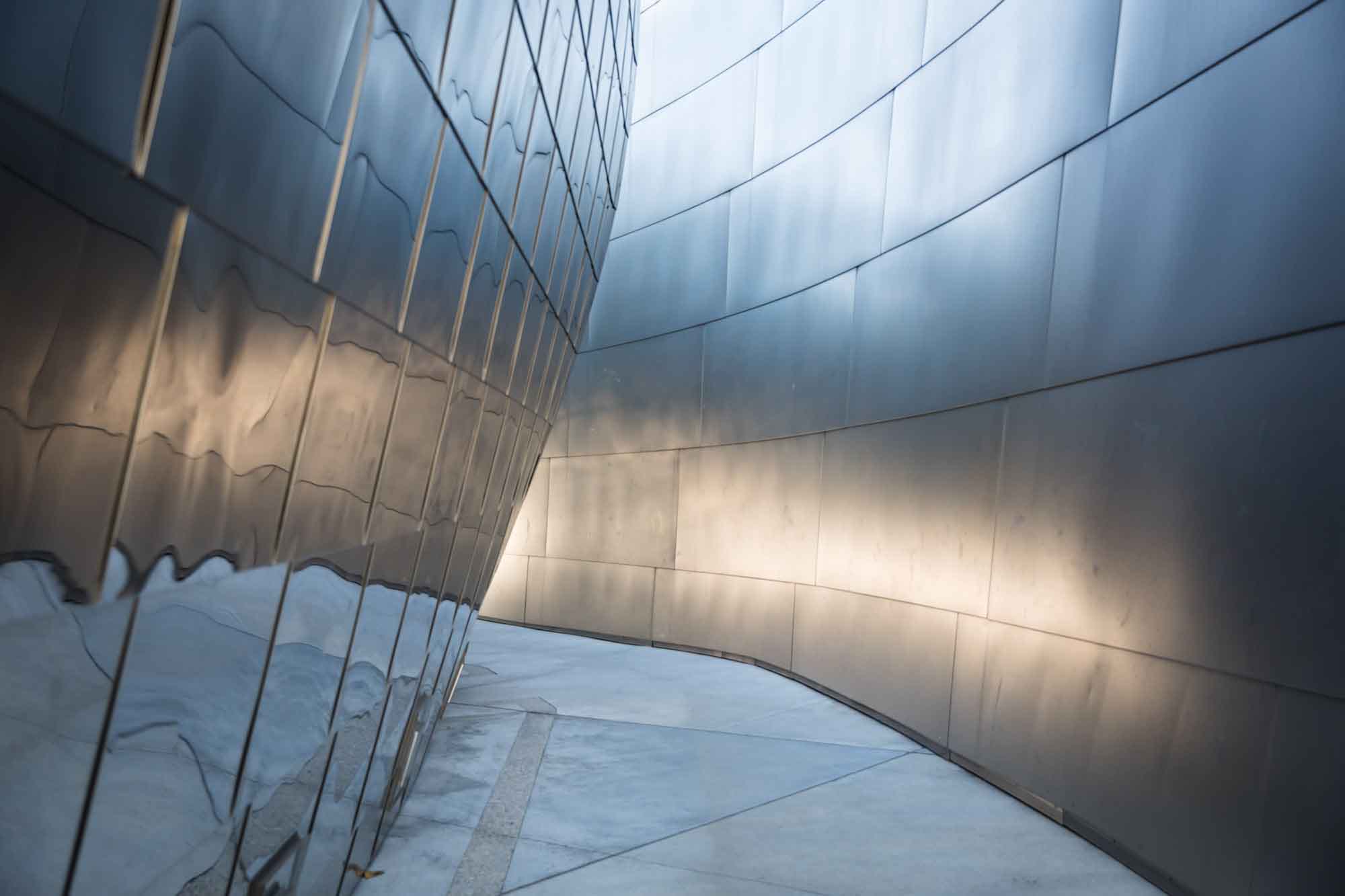 Silver-walled passageway with concrete floor in Blue Ribbon Garden for an article on Walt Disney Concert Hall photos