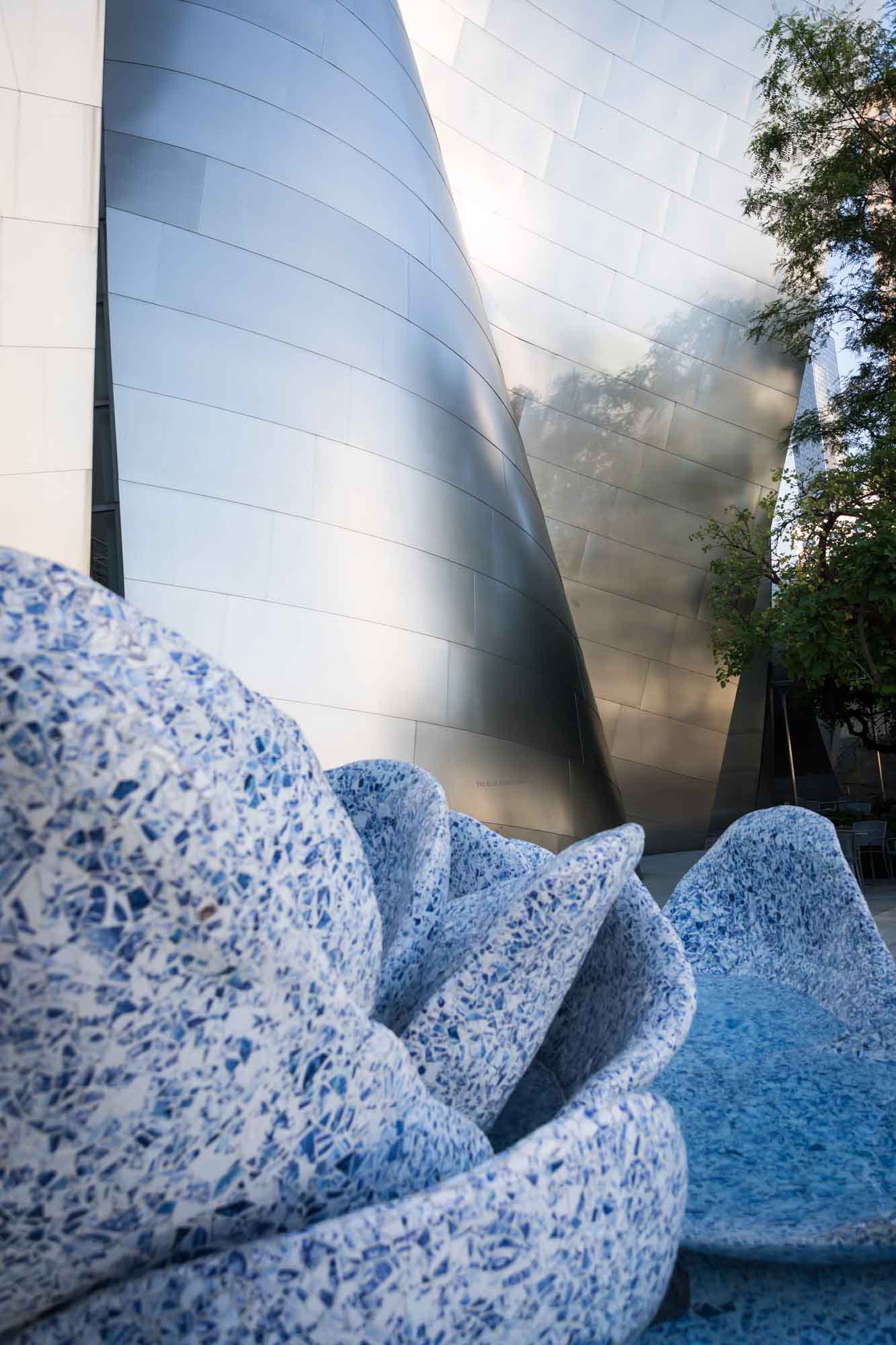 Petals of 'A Rose for Lilly' fountain in front of silver walls of Walt Disney Concert Hall on roof of Blue Ribbon Garden for an article on Walt Disney Concert Hall photos