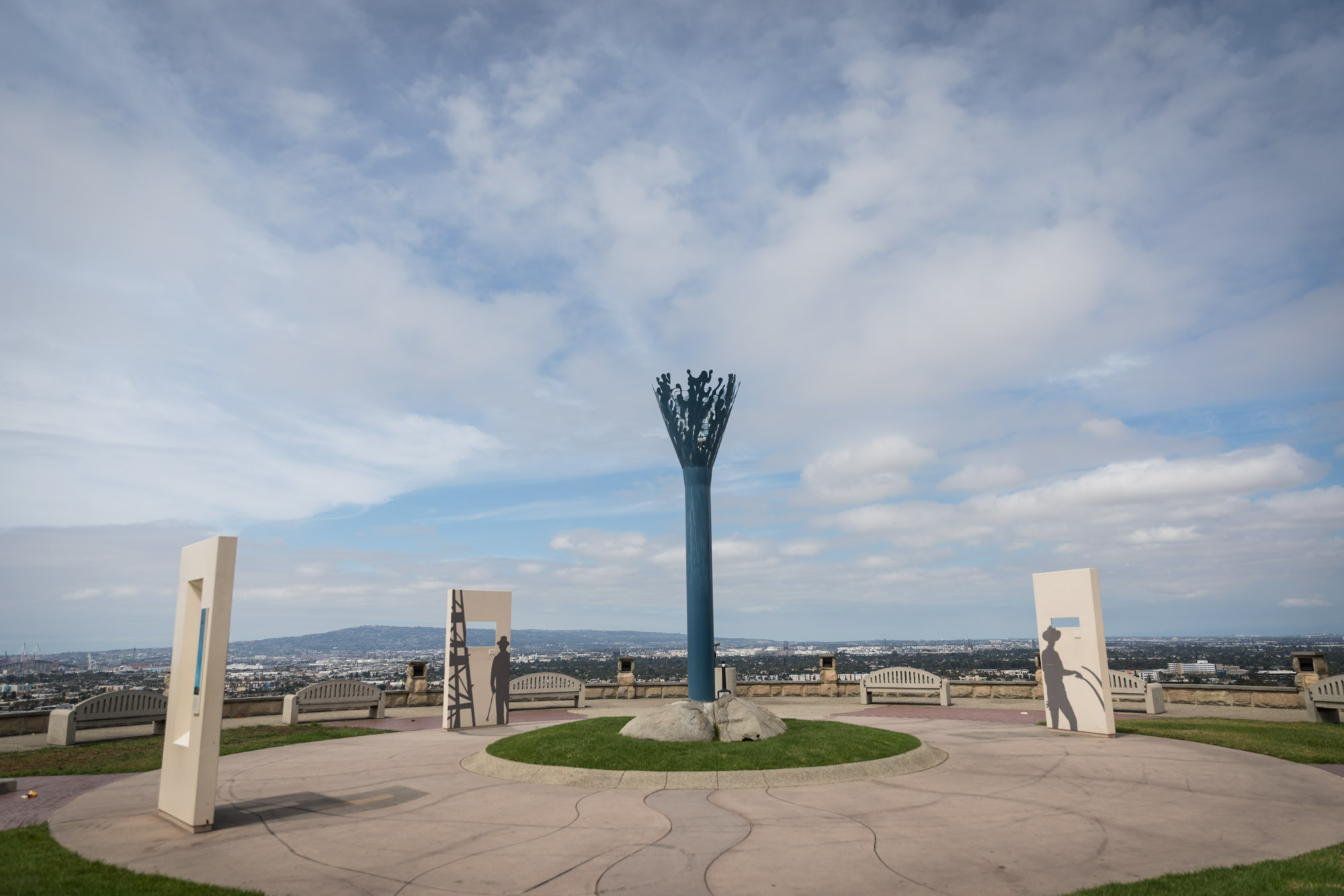 Center of Hilltop Park with public art sculpture in the center for an article on where to propose in Long Beach