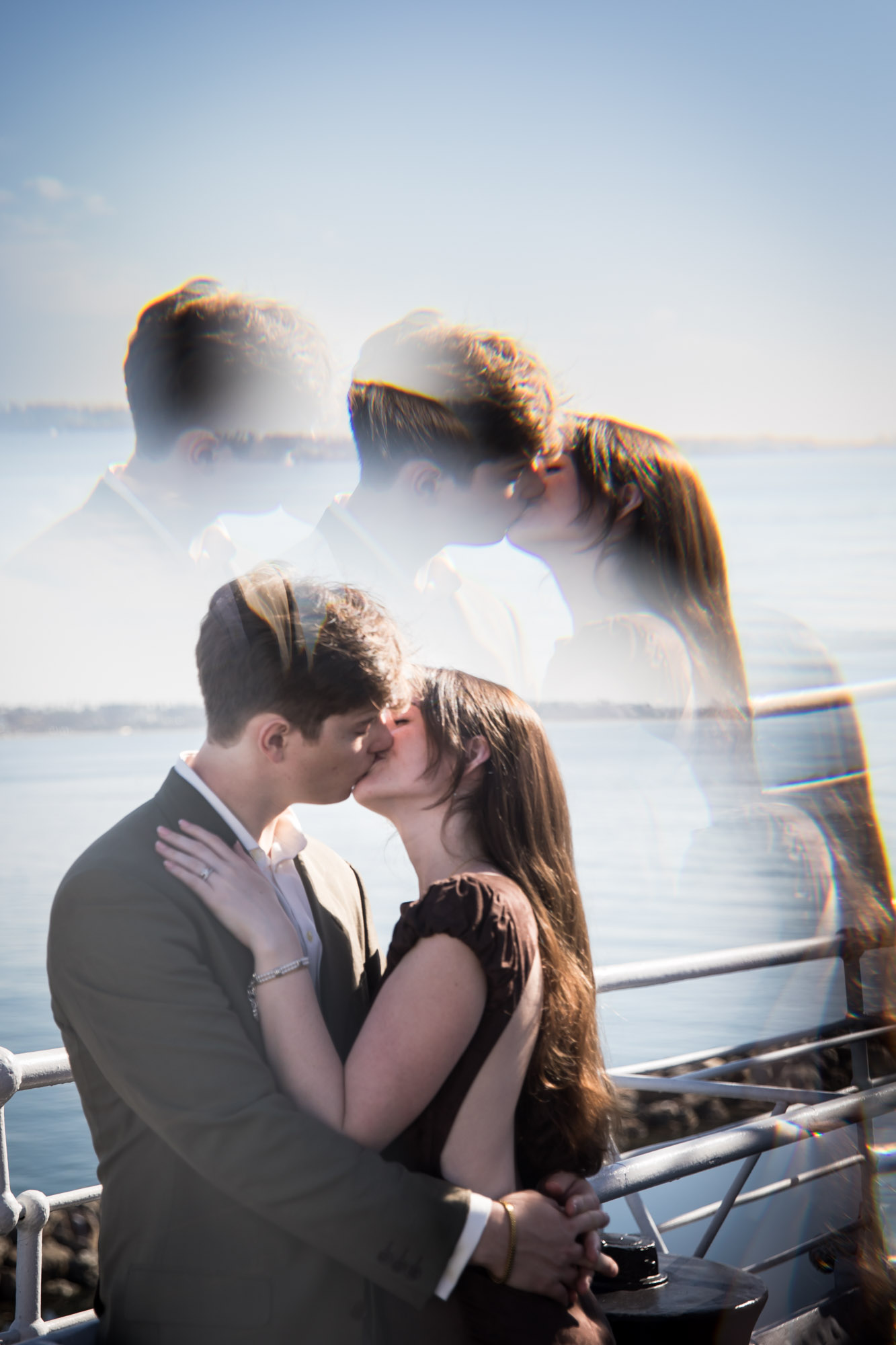 Double-exposure photo of a couple kissing at the ship's railing with a ghosted second image above them, Queen Mary photo shoot